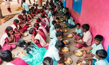 Intergenerational Nutrition Benefits of India’s National School Feeding Program